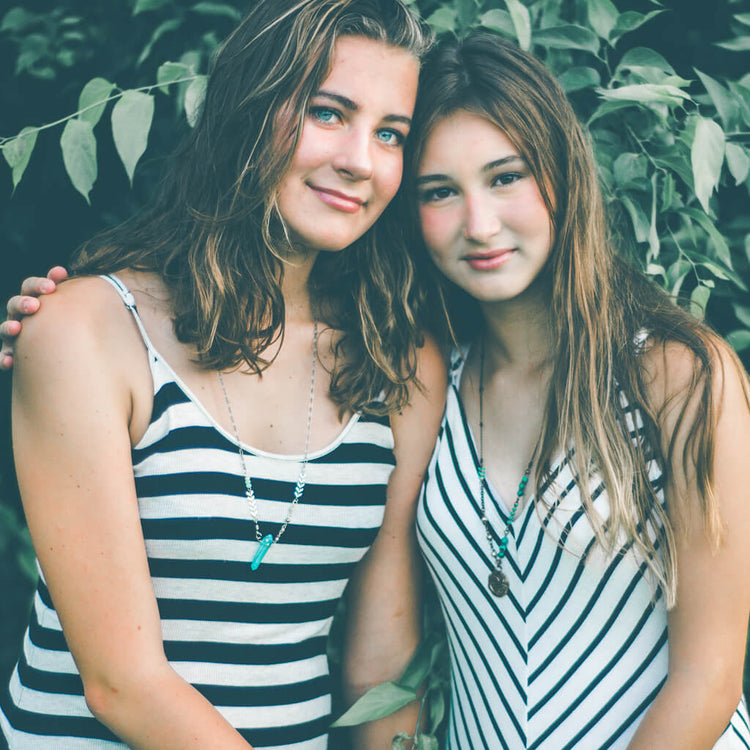 aqua aura // blue quartz crystal pendant necklace worn on model by Peacock and Lime