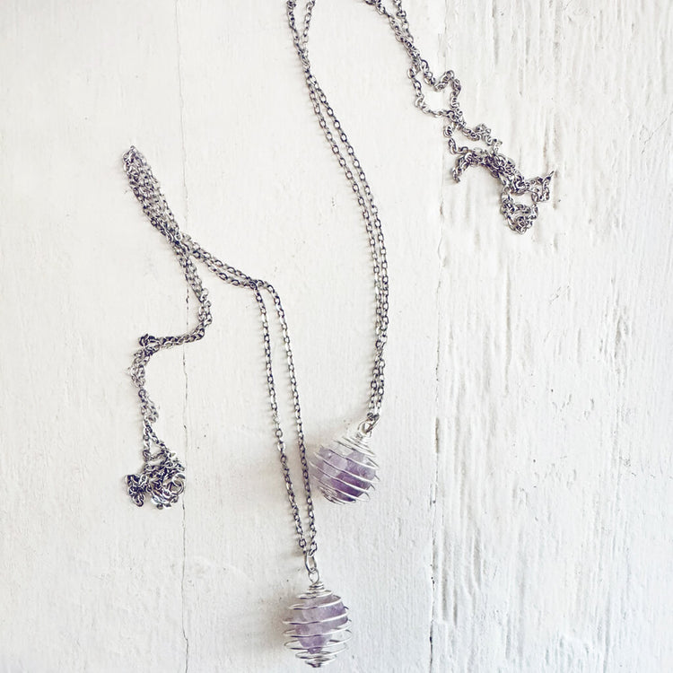 encapsulate silver // caged amethyst quartz crystal gemstone necklace by Peacock & Lime