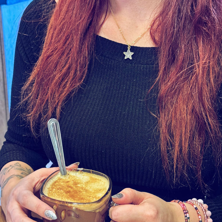 shooting star // simple druzy star pendant necklace worn on model by Peacock & Lime