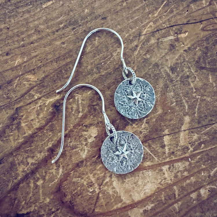 starlight // silver star coin dangle earrings by Peacock and Lime