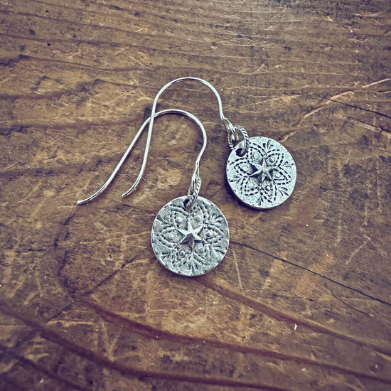starlight // silver star coin dangle earrings by Peacock and Lime