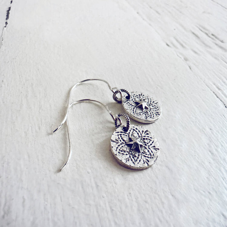 starlight // silver star coin dangle earrings by Peacock and Lime