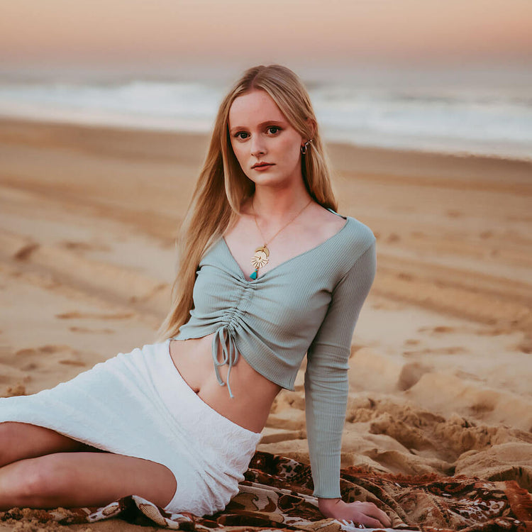 sun down // crescent moon, sun rays & tassel drop necklace worn on model by Peacock & Lime
