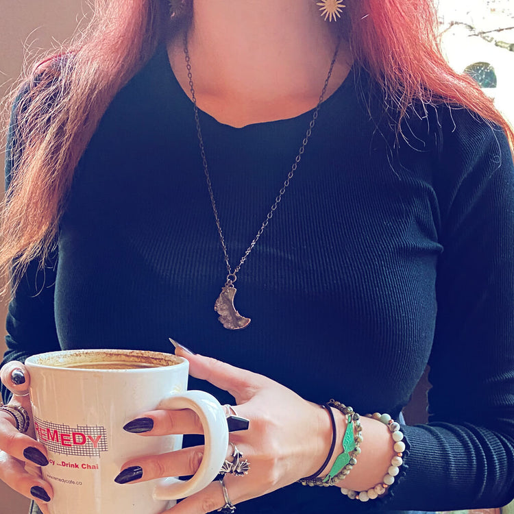 Under an Amethyst Moon // copper electroformed crescent moon pendant necklace worn on model by Peacock & Lime