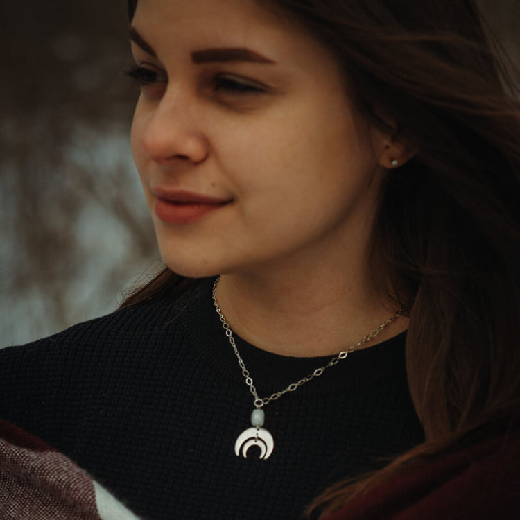 artemis // double crescent moon necklace - with moonstone - worn on model - by Peacock & Lime