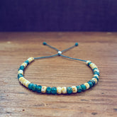 beach side // turquoise blue and white beaded cord bracelet by Peacock & Lime