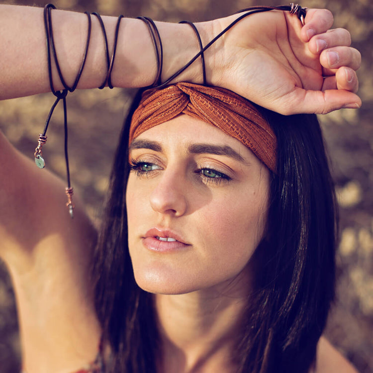 circle positive // copper karma circle bohemian lariat choker style necklace worn as bracelet and pinky ring on model Eden - Peacock & Lime
