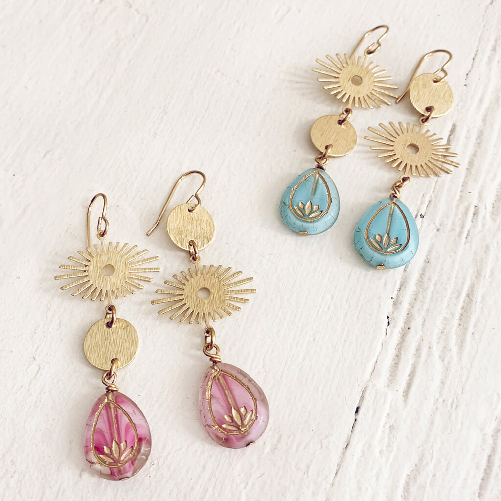 cosmic eye asymmetrical lotus flower celestial brass earrings by Peacock and Lime