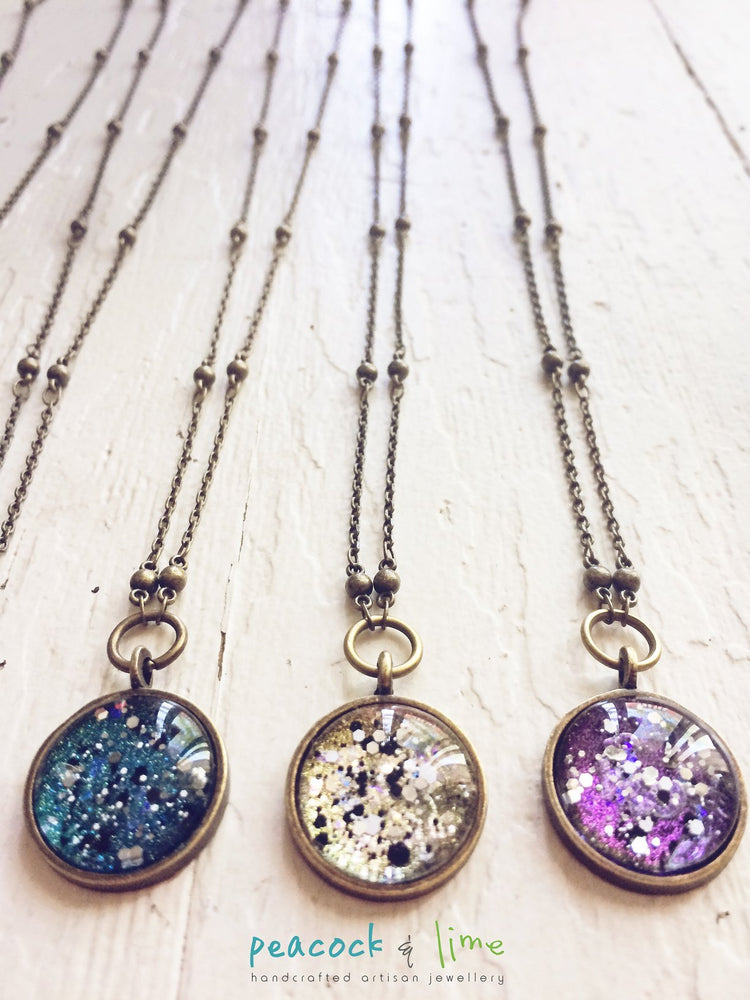cosmic galaxy sparkly celestial necklace - Peacock & Lime