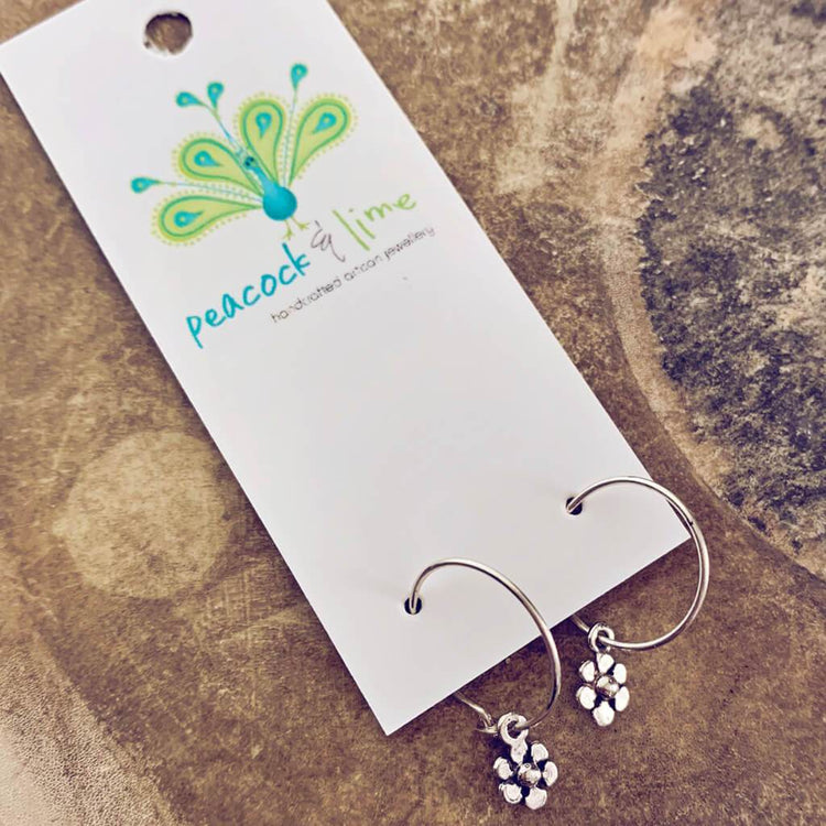 daisy // teeny tiny sterling silver daisy flower sleeper earrings - Peacock & Lime