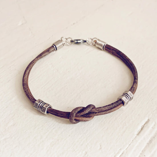 double hex // simple distressed grey brown leather knot bracelet with pewter hex beads by Peacock & Lime