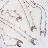 lunula // flame kissed silver boho crescent moon necklaces by Peacock & Lime