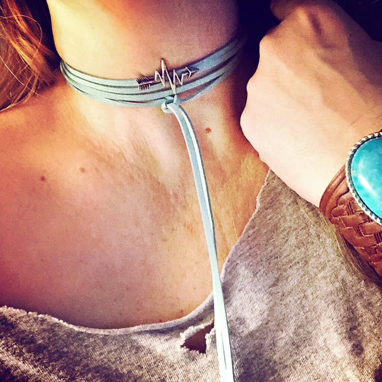 full of life // heartbeat arrow choker necklace - wrap bracelet - worn on model - by Peacock and Lime