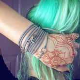 full of life // heartbeat arrow choker necklace - wrap bracelet - worn on model - by Peacock and Lime