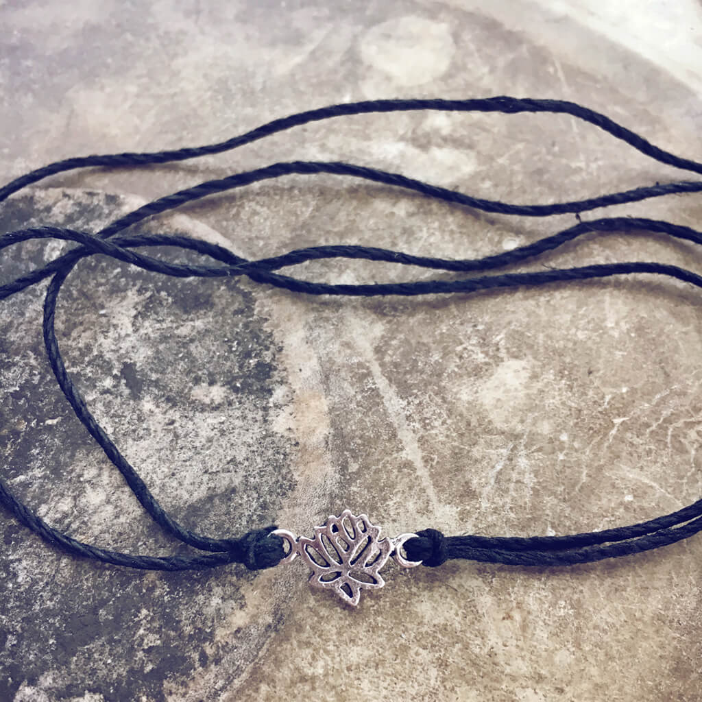 grounded lotus // beachy bracelet style pack - lotus charm with hemp tie by Peacock and Lime