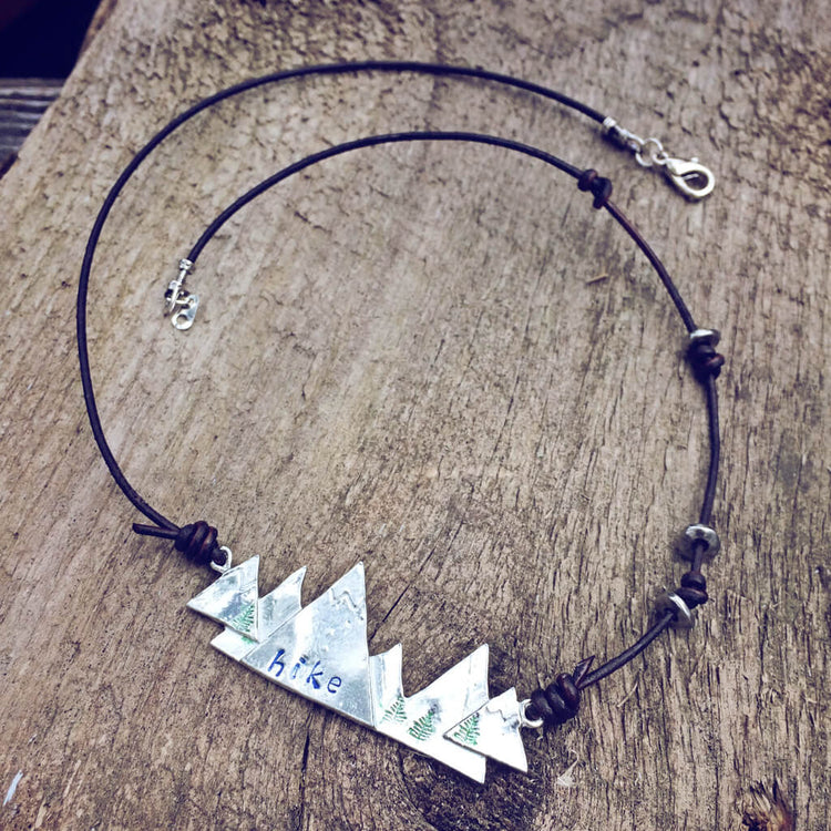 hike ii / hand stamped mountain pewter and leather pendant necklace by Peacock and Lime