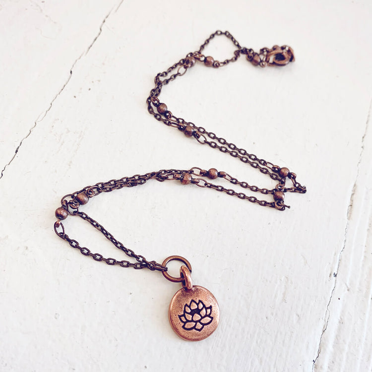 little lotus flower antique copper pendant necklace by Peacock & Lime