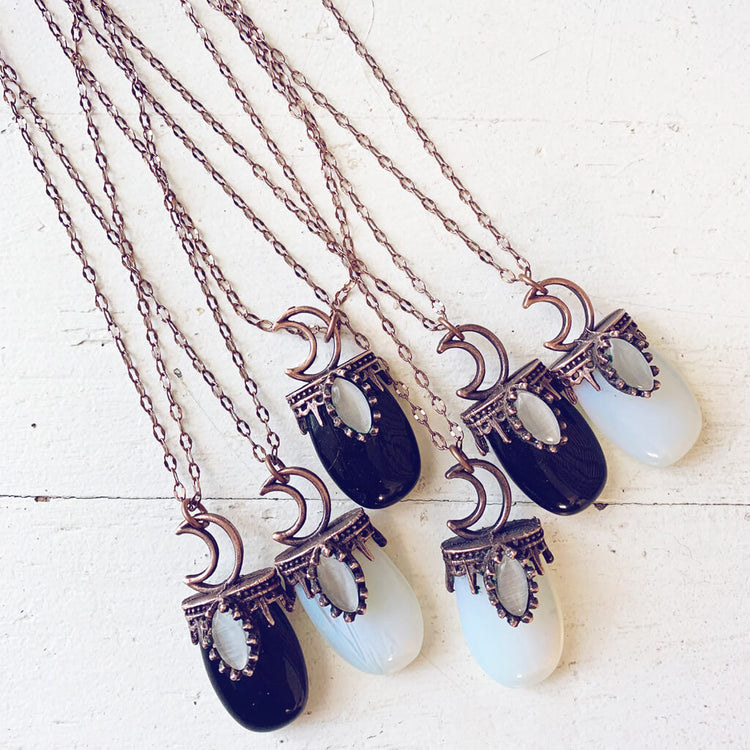 lux ex tenebris // copper electroformed opalite or black agate and crescent moon necklaces by Peacock and Lime