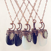 lux ex tenebris // copper electroformed opalite or black agate and crescent moon necklaces by Peacock and Lime