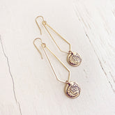 moon flower //long brass chevron earrings with moon & flower charm by Peacock & Lime