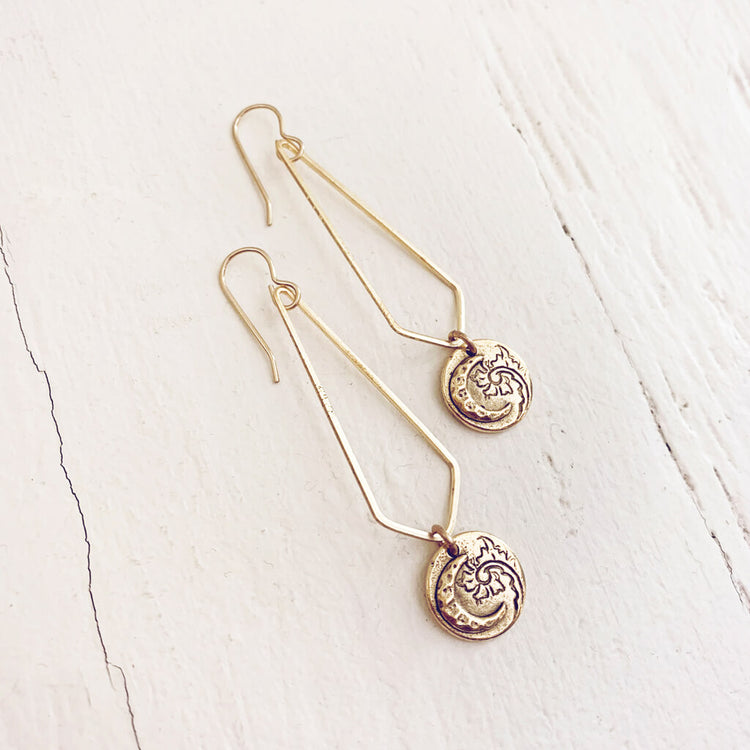 moon flower //long brass chevron earrings with moon & flower charm by Peacock & Lime