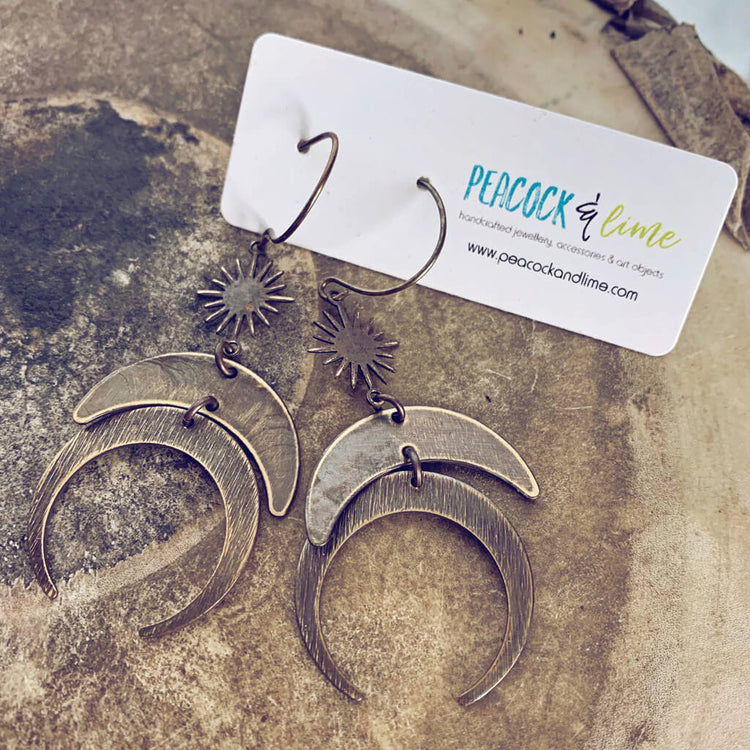 moondust // boho brass sun and moon dangle earrings - Peacock & Lime