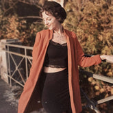 pulsar // boho antiqued brass sun star triangle & peridot earrings worn on model - Peacock & Lime