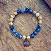 sand & sea // sodalite and picture jasper mala bead bracelet with sand dollar by Peacock & Lime