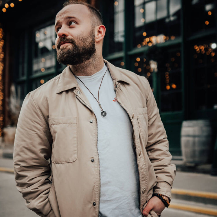 sen // aged japanese coin linen and leather necklace worn on model by Peacock & Lime