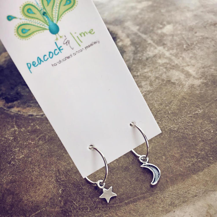 solasta // teeny tiny sterling silver star and crescent moon hoop earrings⁣ - Peacock & Lime