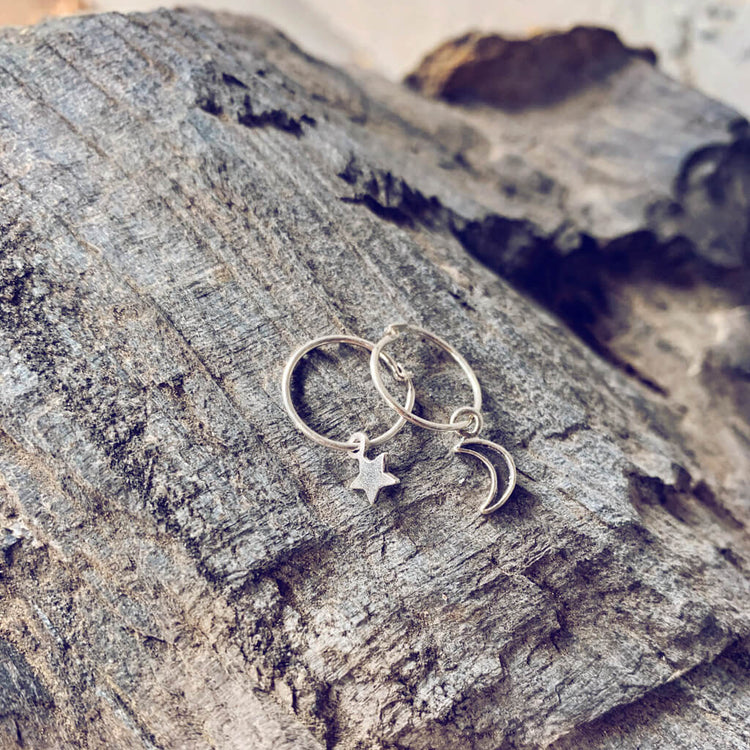 solasta // teeny tiny sterling silver star and crescent moon hoop earrings⁣ - Peacock & Lime