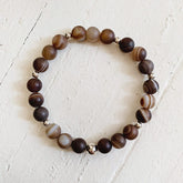 stability II // brown line agate and rose gold mala bead bracelet - Peacock & Lime
