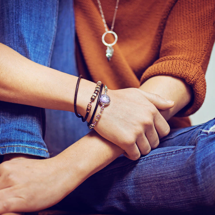 star mandala // silver plated puffed coin & glass bead leather wrap bracelet worn on model by Peacock & Lime