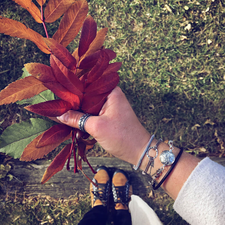 star mandala // silver plated puffed coin & glass bead leather wrap bracelet by Peacock & Lime
