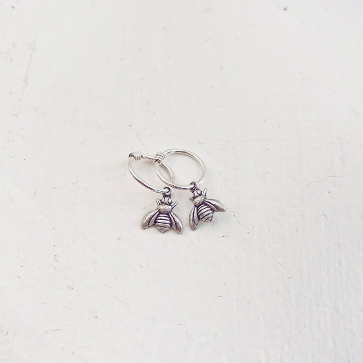 honey bee // teeny tiny sterling silver bee hoop sleeper earrings⁣ - Peacock & Lime