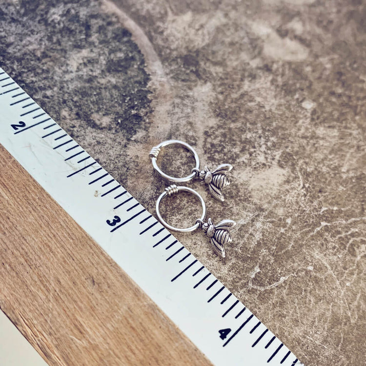 honey bee // teeny tiny sterling silver bee hoop sleeper earrings⁣ - Peacock & Lime