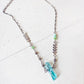 aqua aura // blue quartz crystal pendant necklace by Peacock and Lime