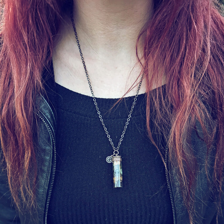bewitch ii // tall spell jar glass bottle pendant necklace worn on model by Peacock & Lime