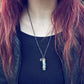 bewitch ii // tall spell jar glass bottle pendant necklace worn on model by Peacock & Lime