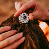 bohemian moon // antique brass hair fork stick pin with moon sun and flower motif worn on model by Peacock and Lime