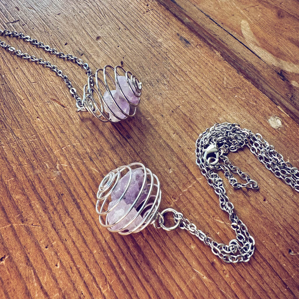 encapsulate silver // caged amethyst quartz crystal gemstone necklace by Peacock & Lime