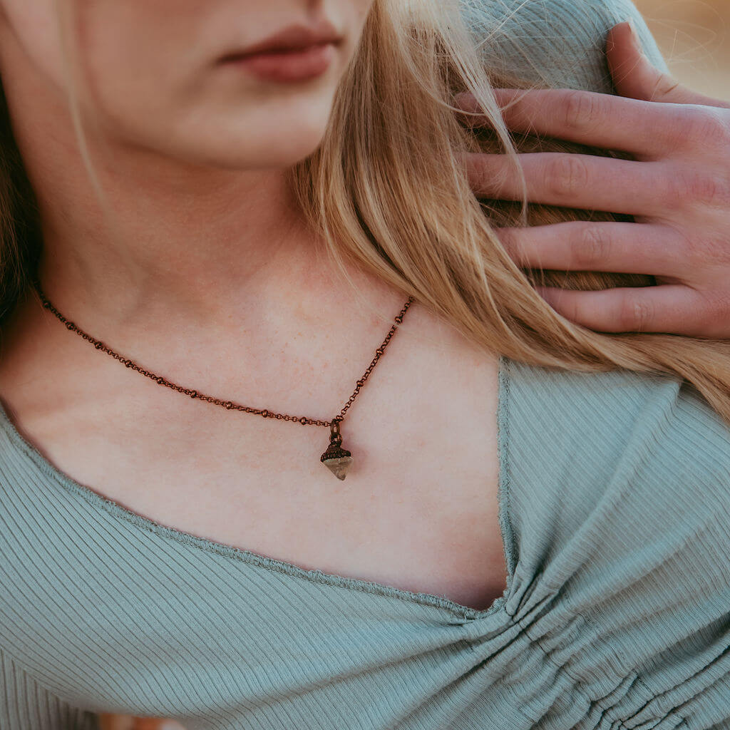 gem // tiny copper electroformed fluorite pendant necklace worn on model by Peacock and Lime