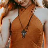 orbis // patina aged darkened sun, moon, sphere & crescent moon necklace worn on model - by Peacock & Lime
