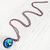 out of this world // glow in the dark bright universe sphere pendant necklace by peacock & lime