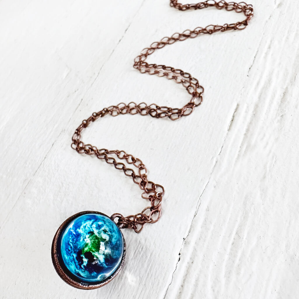 out of this world // glow in the dark bright universe sphere pendant necklace by peacock and lime