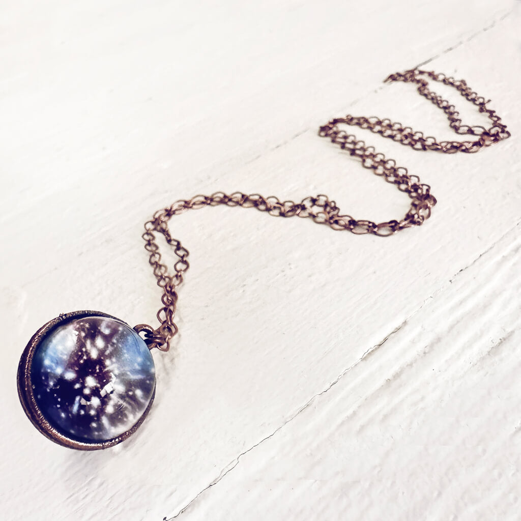 out of this world // glow in the dark galaxy sphere pendant necklace by peacock and lime