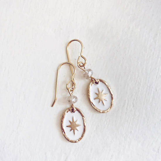 stargazer // enamel and brass oval starburst earrings - brass - by Peacock and Lime