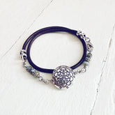 star mandala // silver plated puffed coin & glass bead leather wrap bracelet by Peacock & Lime