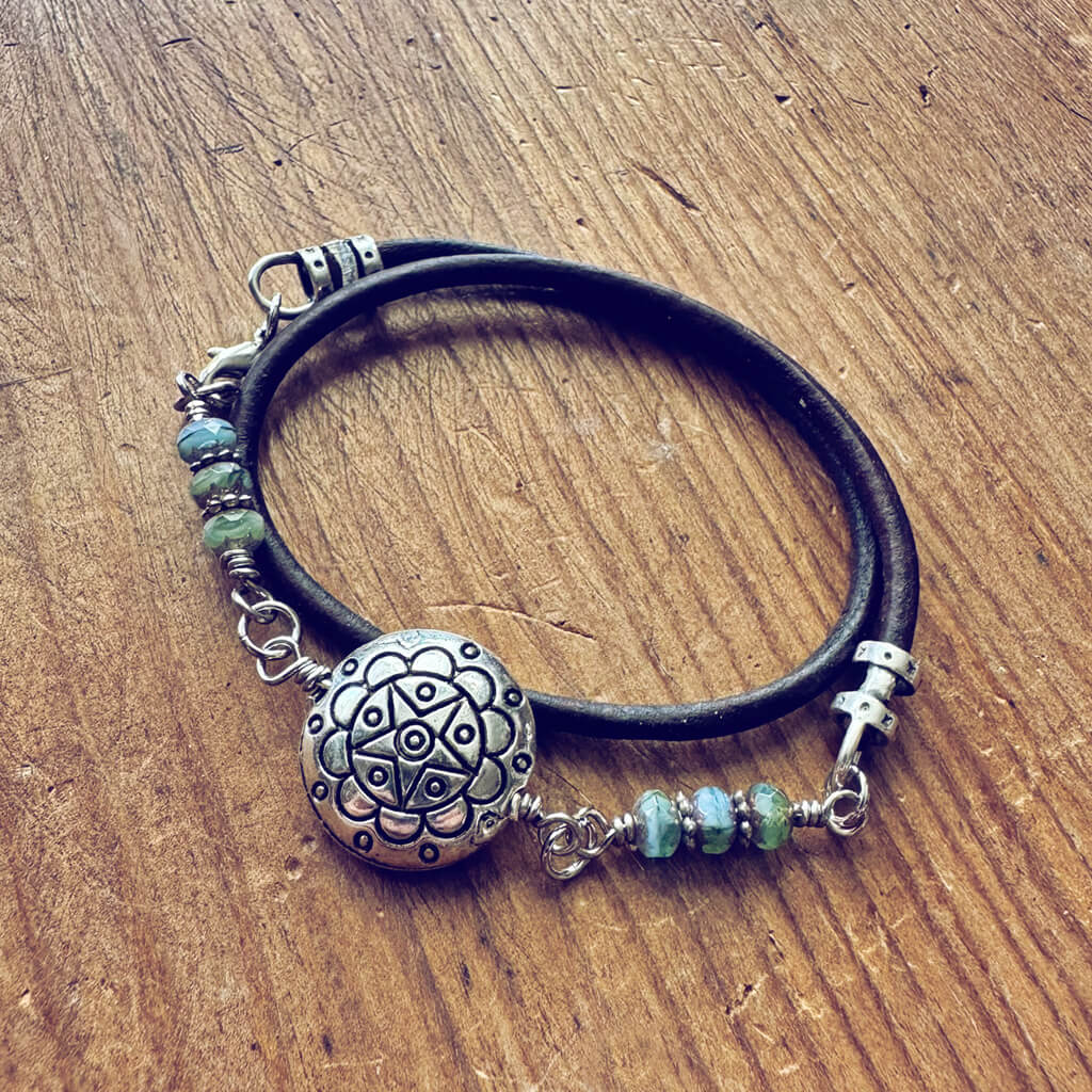 star mandala // silver plated puffed coin & glass bead leather wrap bracelet by Peacock & Lime