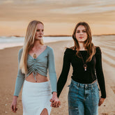 enchantment // copper electroformed crystal gemstone infused roller ball essential oil necklace and sun down / brass moon & tassel necklace  worn on models - by Peacock and Lime